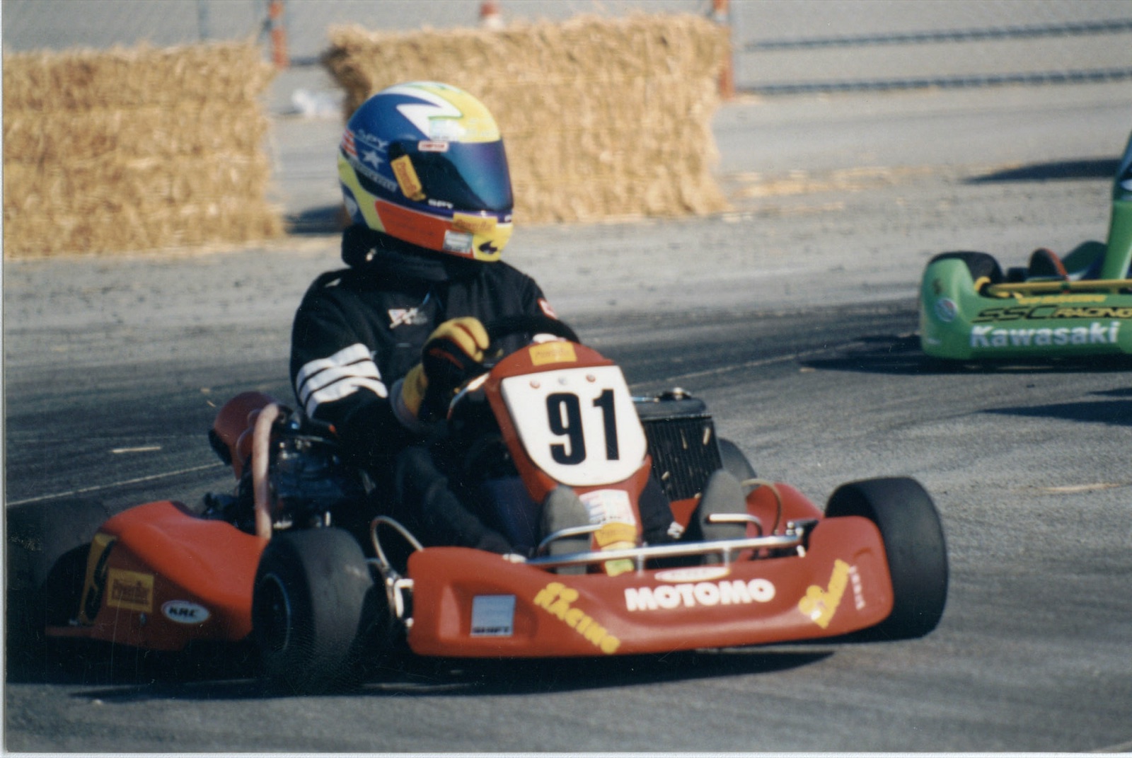 Young Stanton Barrett racing a go-kart, number 91