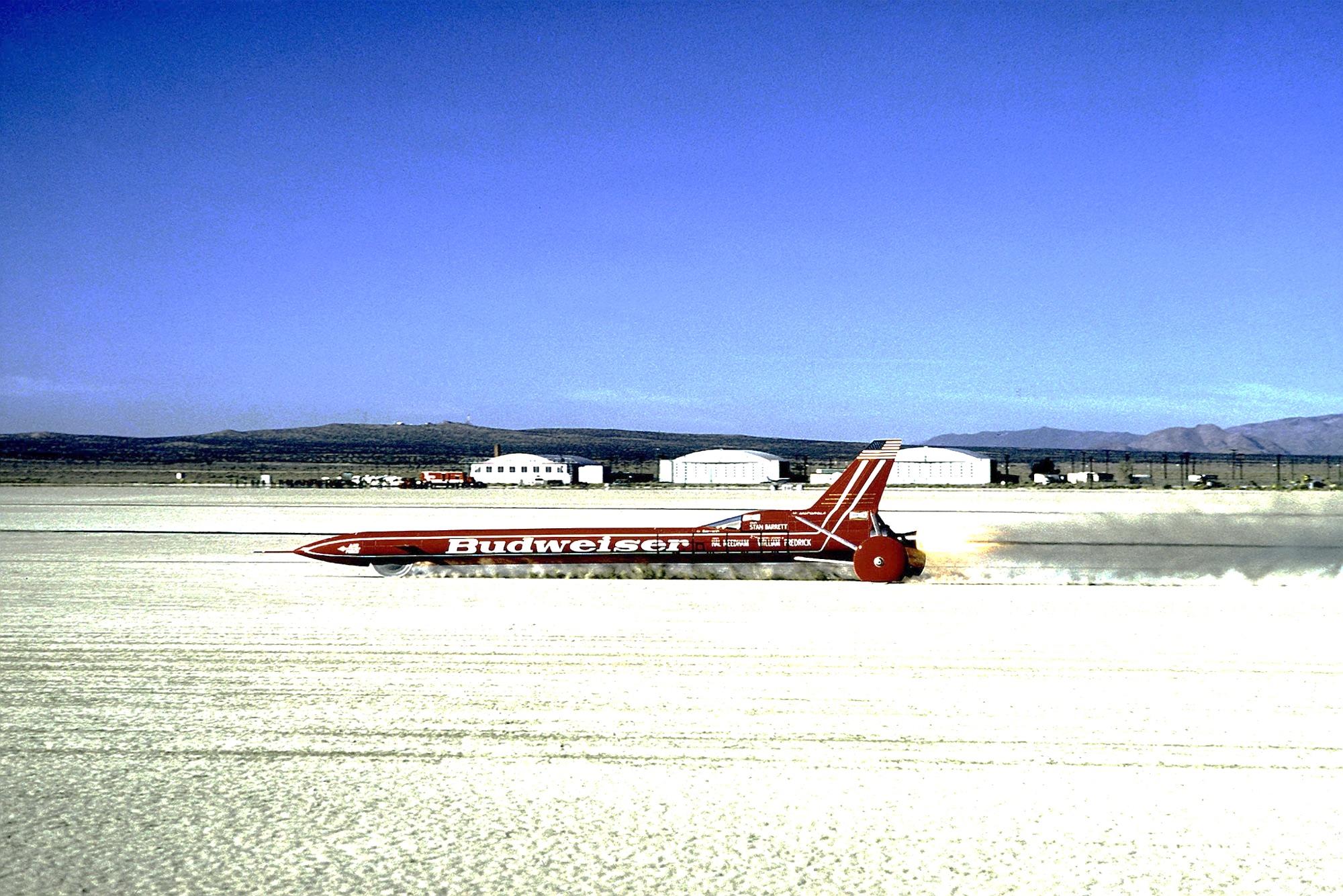 The Budweiser Rocket Car speeding across a desert salt flat